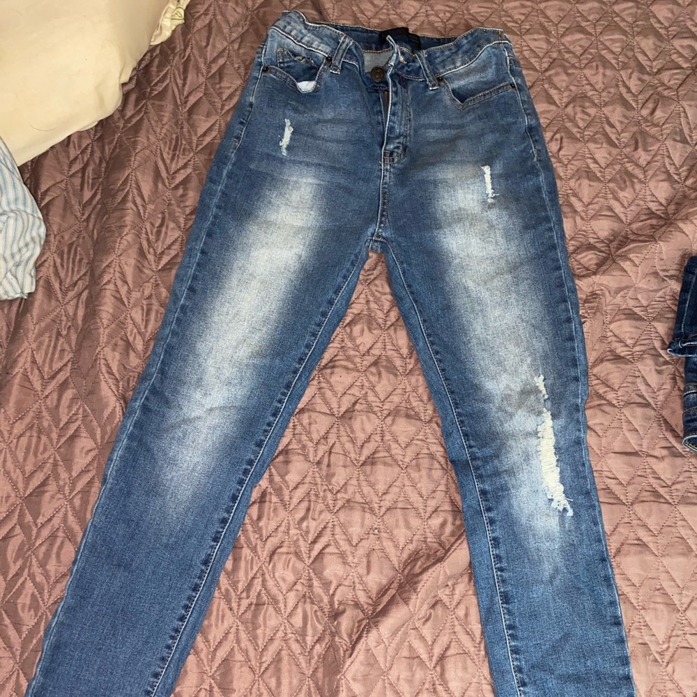 Medium blue wash distressed jeans